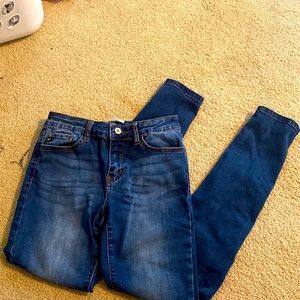 blue jeans with button and zipper